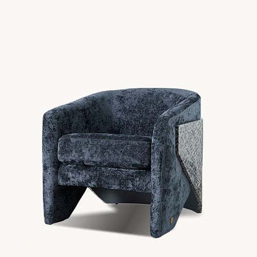 Navy Velvet Occasional Chair with a curved veneer back, adorned with white, black, and blue terrazzo velvet and a comfortable cushioned seat.