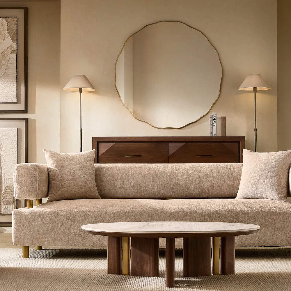 3-seater powder white chenille fabric sofa with brushed gold stainless steel legs, featuring an equal backrest height to the armrests and includes two cushions.