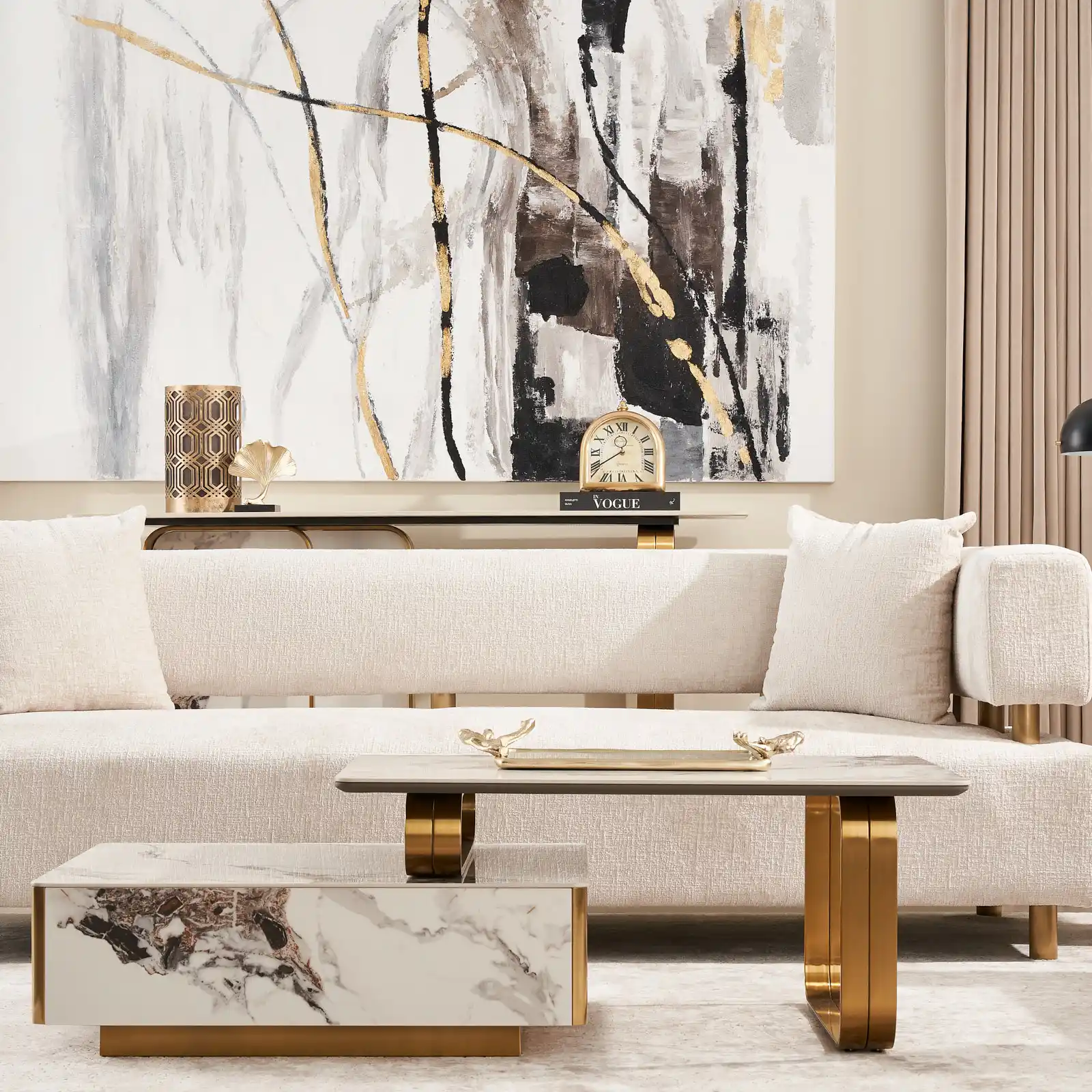  Rectangular two-layered coffee table featuring a white Sintered Stone tabletop and a brushed gold legs.