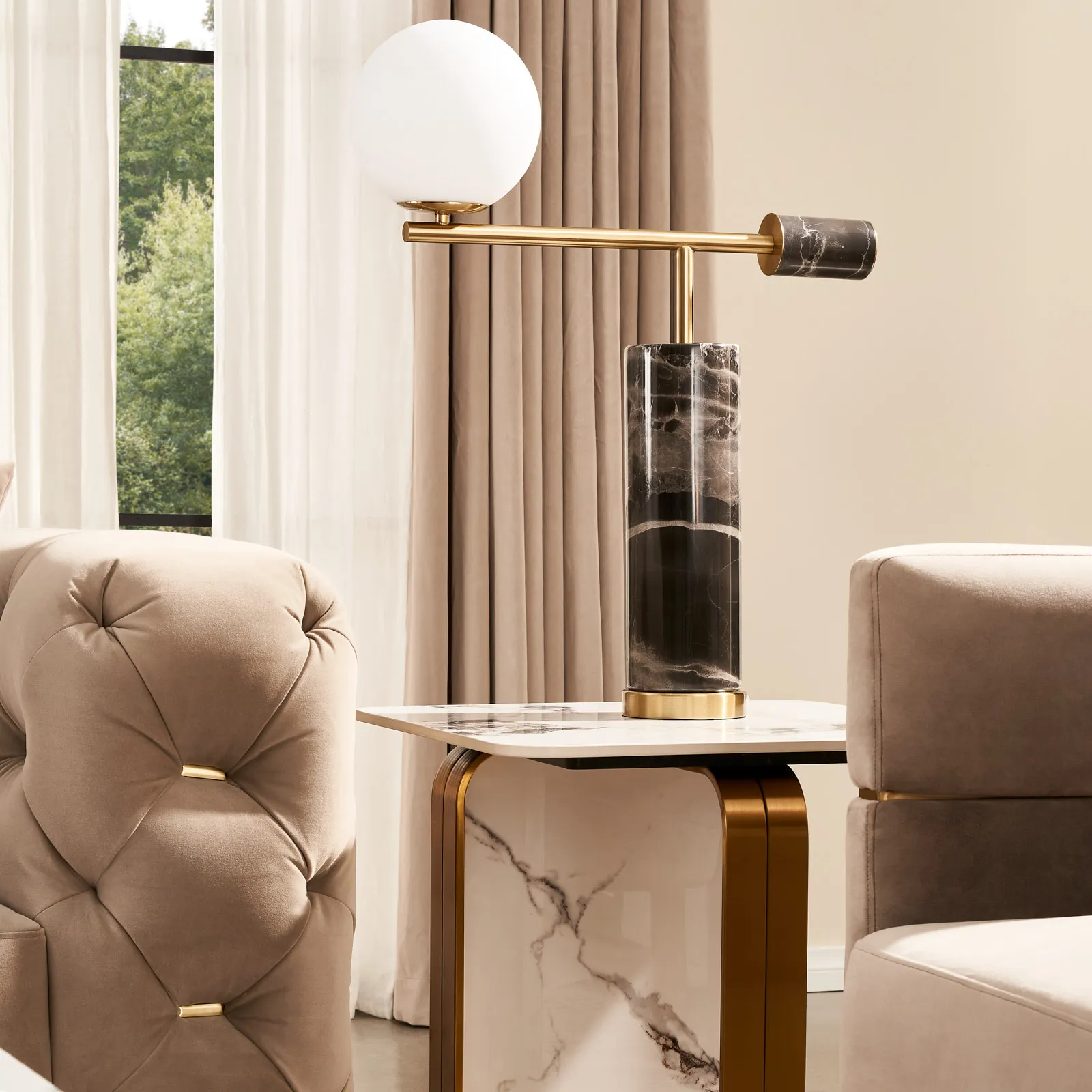 Square side table featuring a cold calacatta white sintered stone tabletop, brushed gold stainless steel base with panel of white sintered stone on one side.